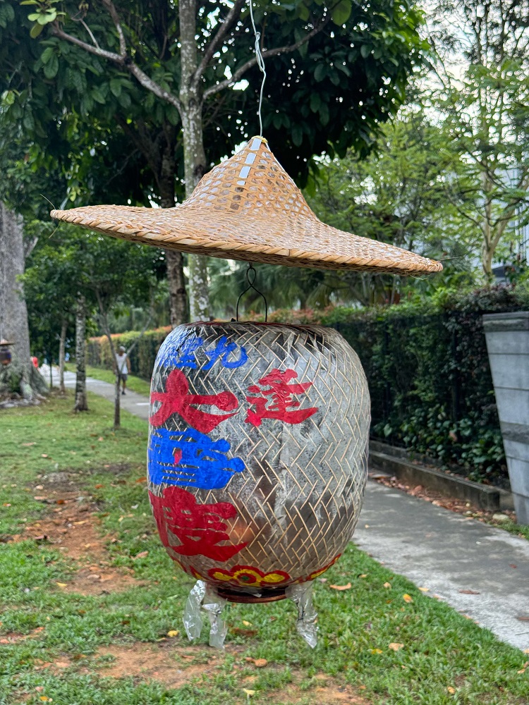 Shaded lantern guiding spirits toward the temple
