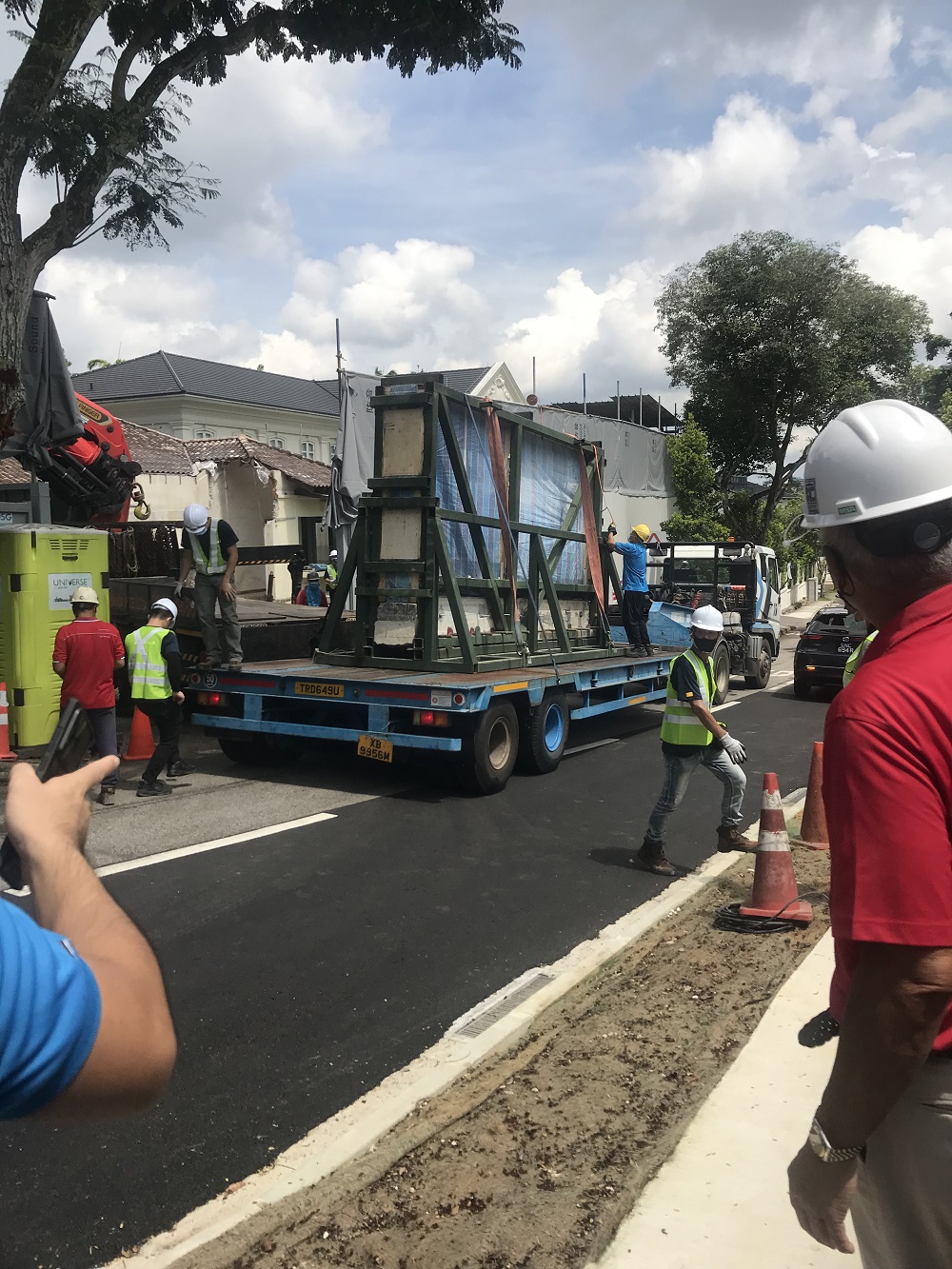The entire package secured onto a flat-bed trailer for transportation