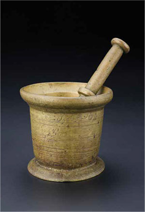 Mortar and pestle belonging to the late Shirin Fozdar, Singapore, late 20th century, brass. 