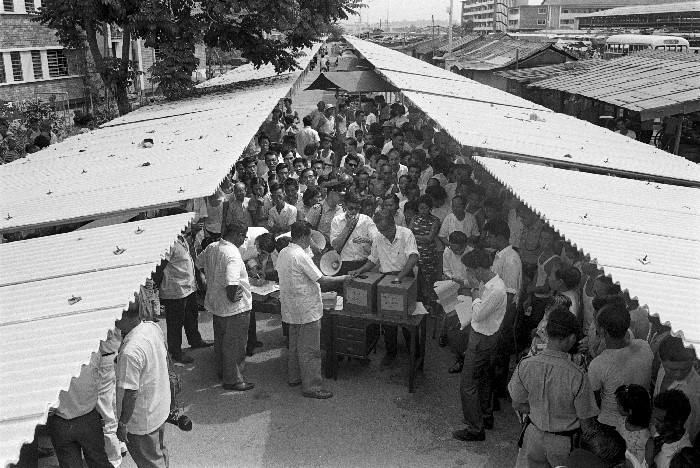 Balloting of market stalls at the old Kallang Airport estate.
