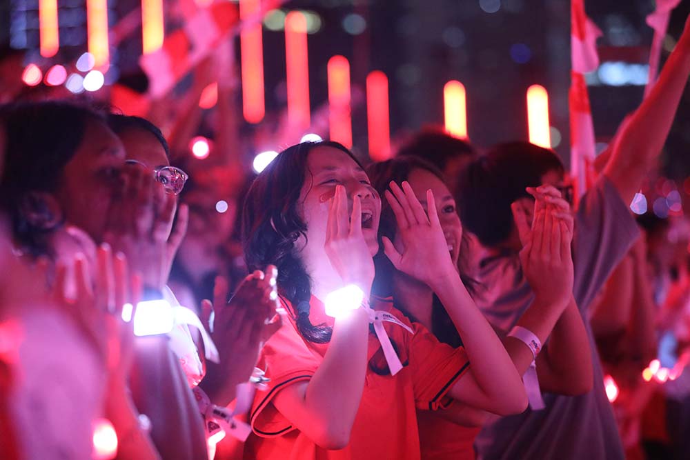 Spectators pictured at a full-dress rehearsal for National Day Parade 2025. (c2025. Image from NDP 25)