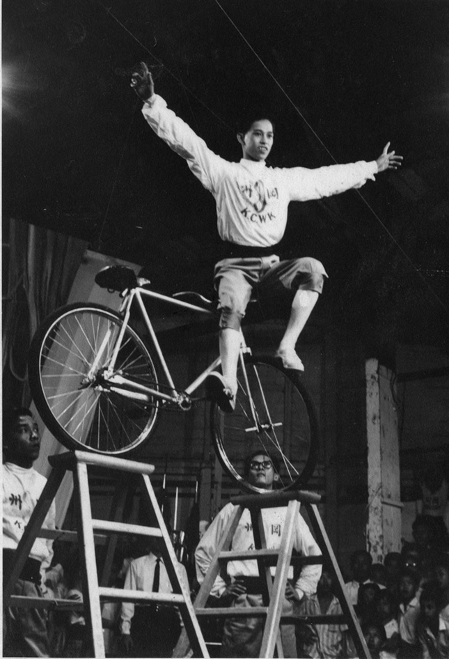 Mr Chia Kum Loke performing a high-risk acrobatic act