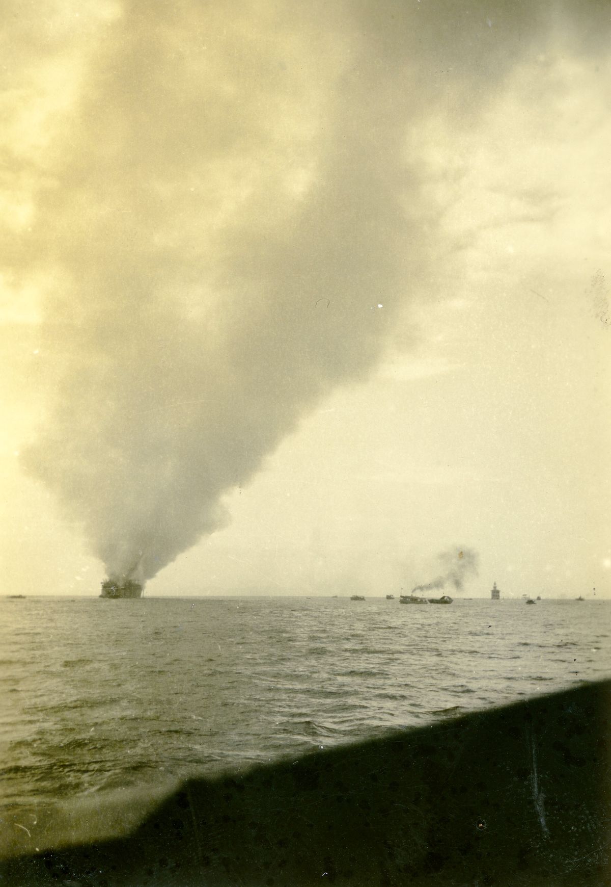 Empress of Asia burning, with Sultan Shoal Lighthouse to the right. Blue Mountains Library , Creative Commons (CC BY-SA 2.0)