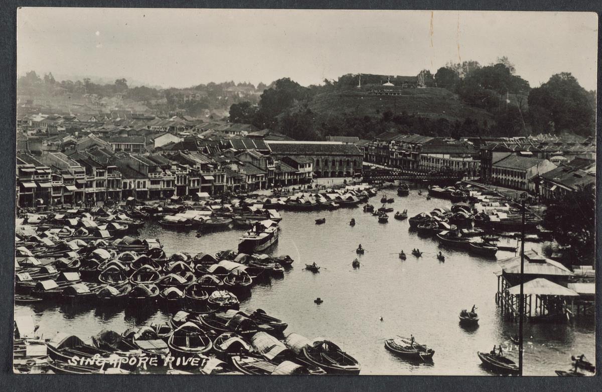 Scene of the crowded Singapore River and Fort Canning