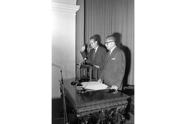 E W Barker at the Swearing in session for his post as Minister of Law