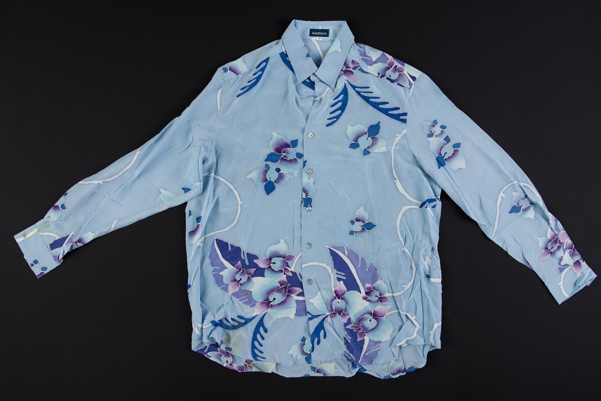 Light blue floral patterned blouse