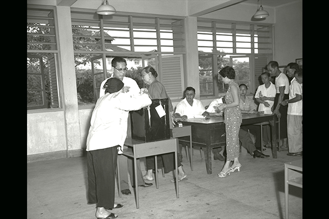 Many first-time voters casting their votes on polling day during the first General Elections in Singapore. (1959).