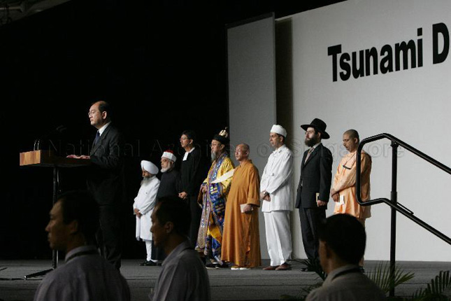 Baha'i Faith religious leader reciting prayers