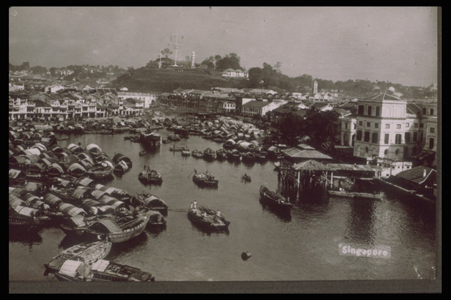 Boat Quay with the Fort Canning Lighthouse visible in the background