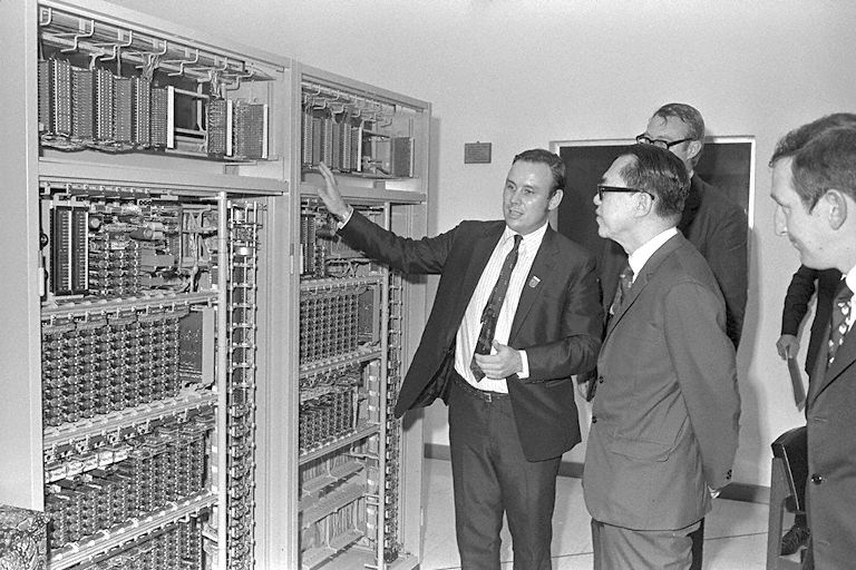 Minister for Finance Hon Sui Sen (centre) being shown the telephone exchange during a tour of Philips Telecommunications Factory in Jurong on its opening, 03/04/1973