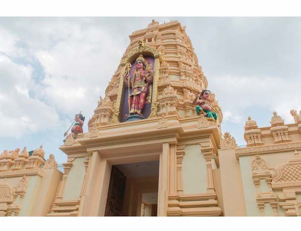 The temple’s raja-gopuram (tower entrance) includes an ornate statue of the goddess Kali. The temple’s main sanctum is dedicated to Kali, and includes a suthai sirpam (large relief) of the goddess and gold-plated kodi maram (flag staff).