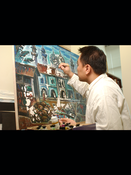 Conservators with paintings