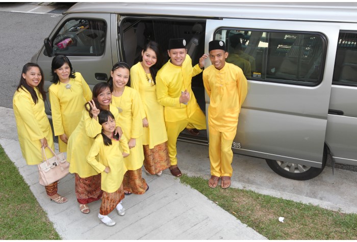 Family dressed up for Hari Raya Puasa