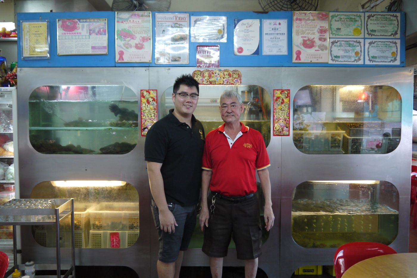 Mr Teh Chor Joo (right) and Mr Dextre Teh are the owners of Ban Leong Wah Hoe Seafood Restaurant. The older Mr Teh is also the chef of the three-decade-old eatery, while Dextre manages the administrative and marketing elements of the business.