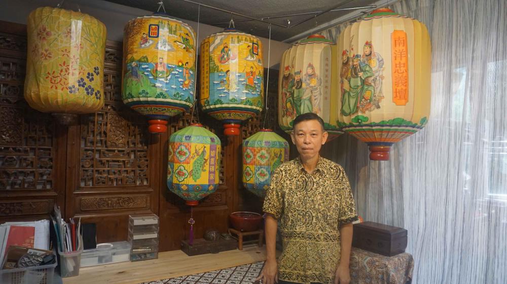 Mr Wong stands in front of his completed Foochow lanterns.