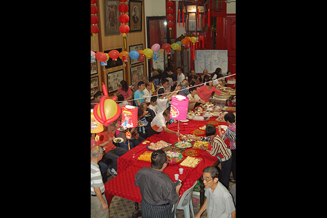 Celebrating the Mid-Autumn Festival at the Kong Chow Wui Koon Clan Association.