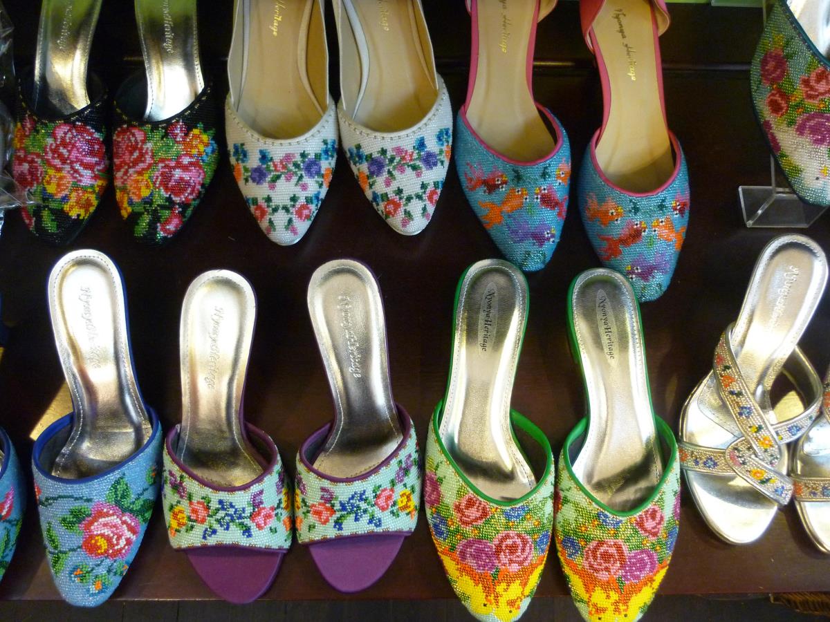 Beaded slippers or kasut manek are an essential part of Peranakan culture. Each shoe is constructed by stitching beaded cloth onto a shoe frame.