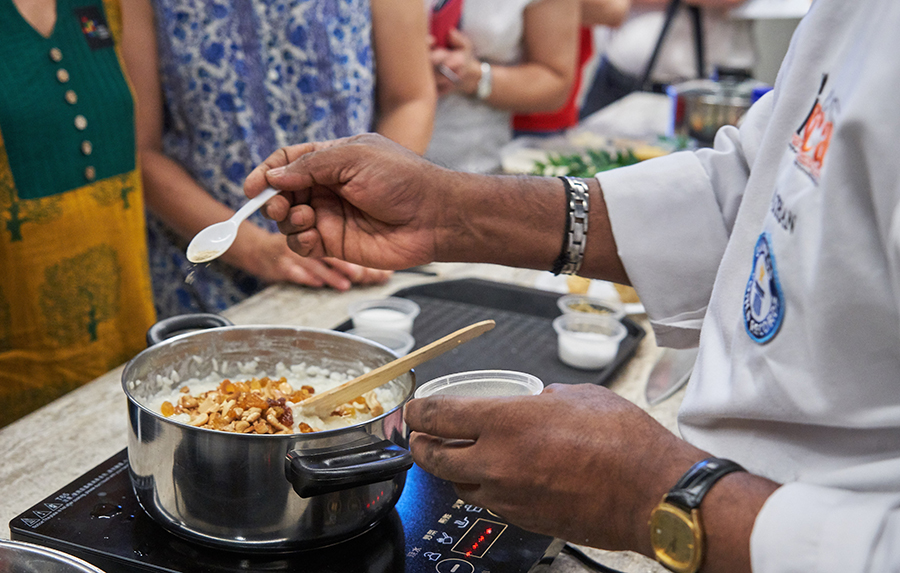 The Pongal dish being shared with guests.