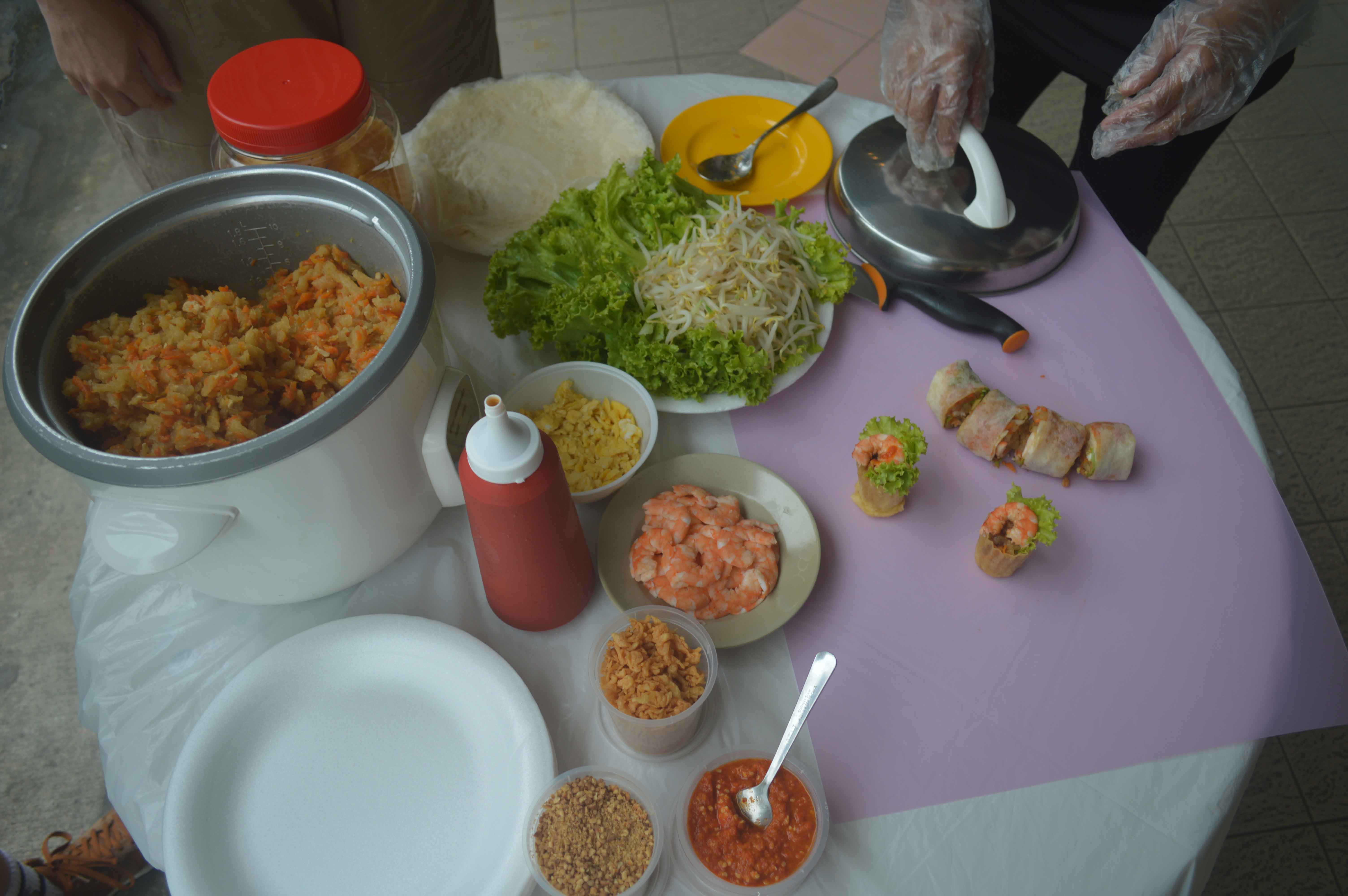 The ingredients for making popiah and kueh pie tee, which are shown on the purple sheet of paper. 