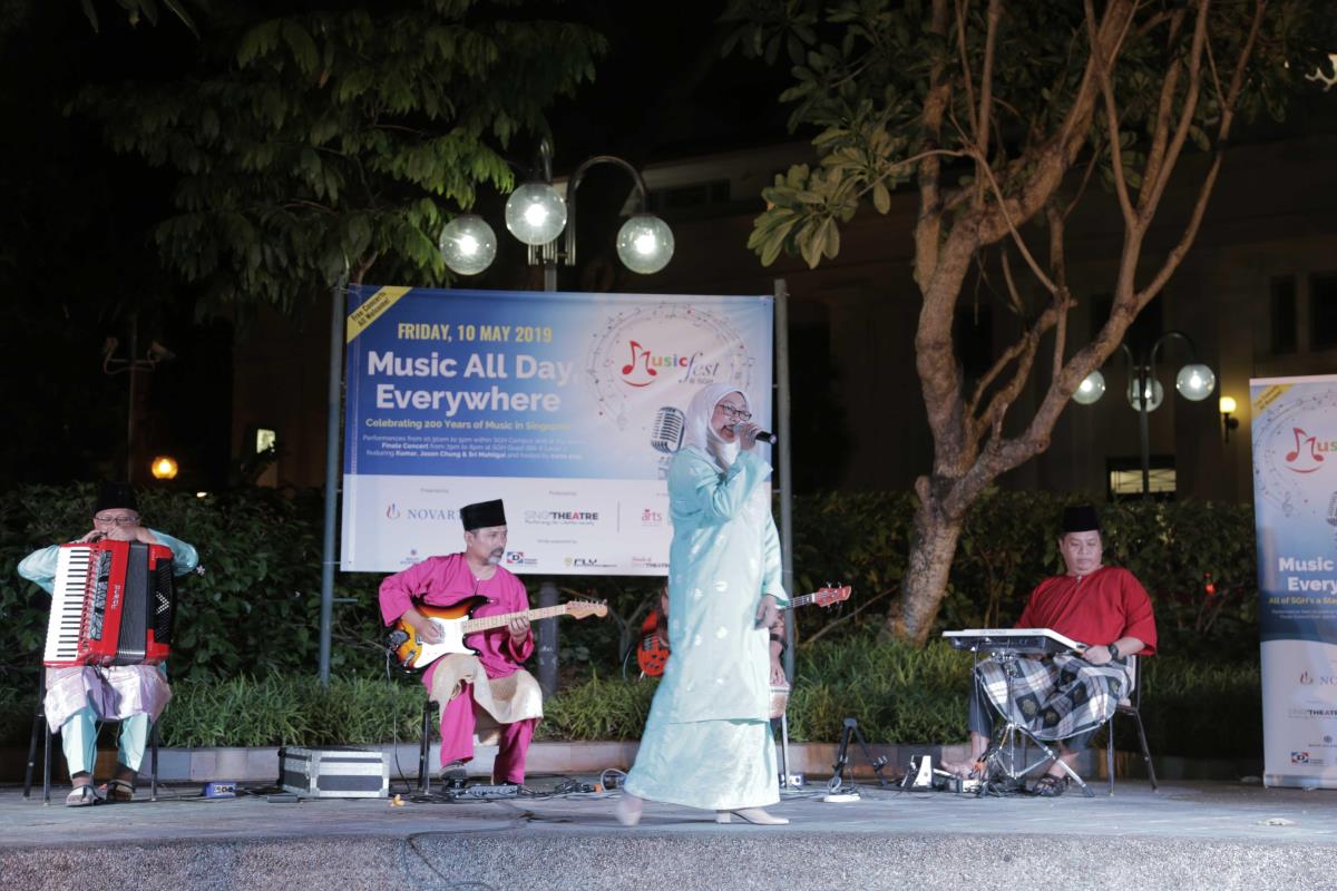 Band members of Sri Mahligai Orkes Tradisional Melayu performing at a music festival in May 2019.