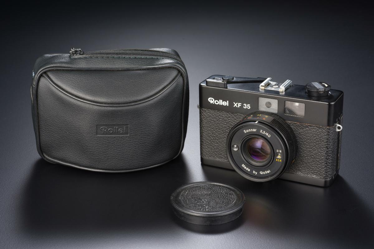 Rollei XF35 rangefinder camera with case and lens cover Rollei XF35 rangefinder camera with case and lens cover