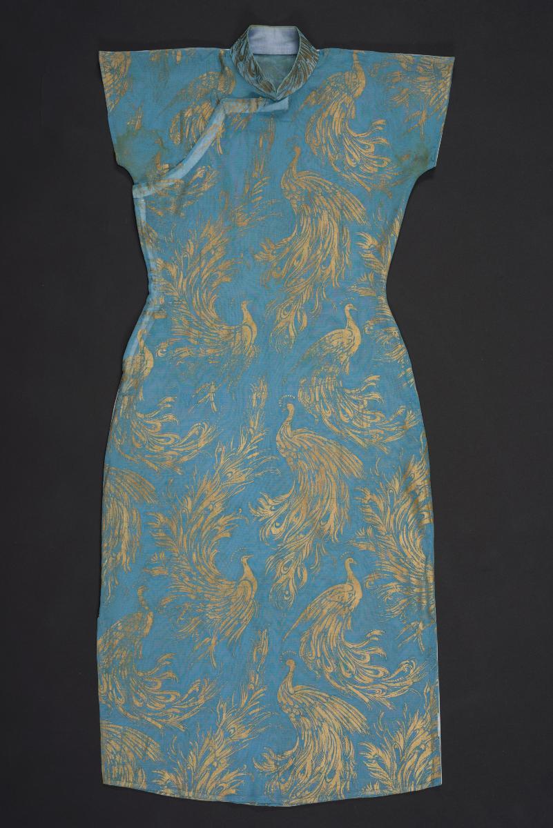 Blue cheongsam with golden peacock motif