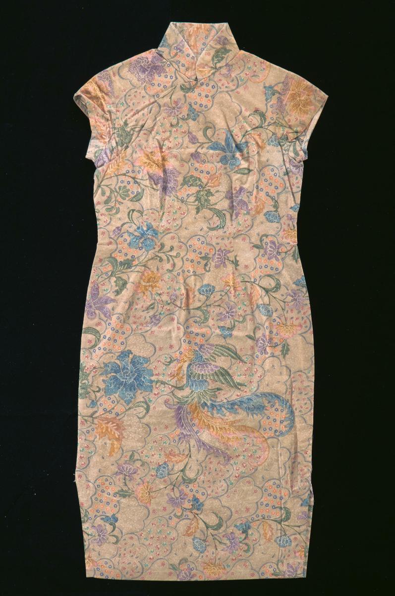 A beige batik cheongsam