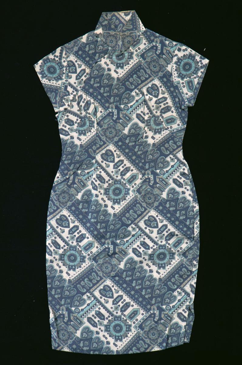 A purple cheongsam with circle and paisley motifs