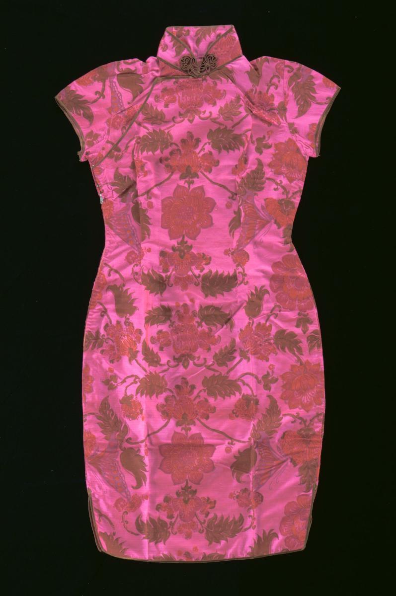 A fuchsia floral cheongsam with brown piping