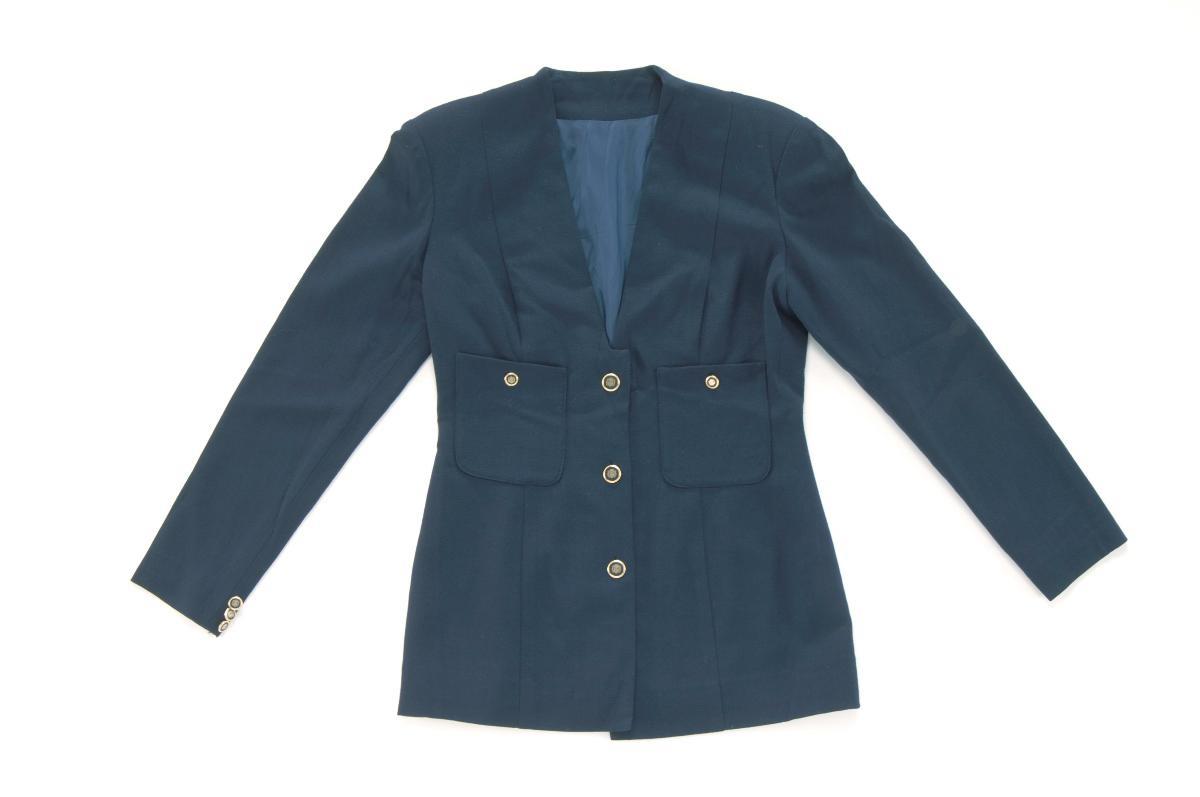 A navy blue blazer by Andrew Gn
