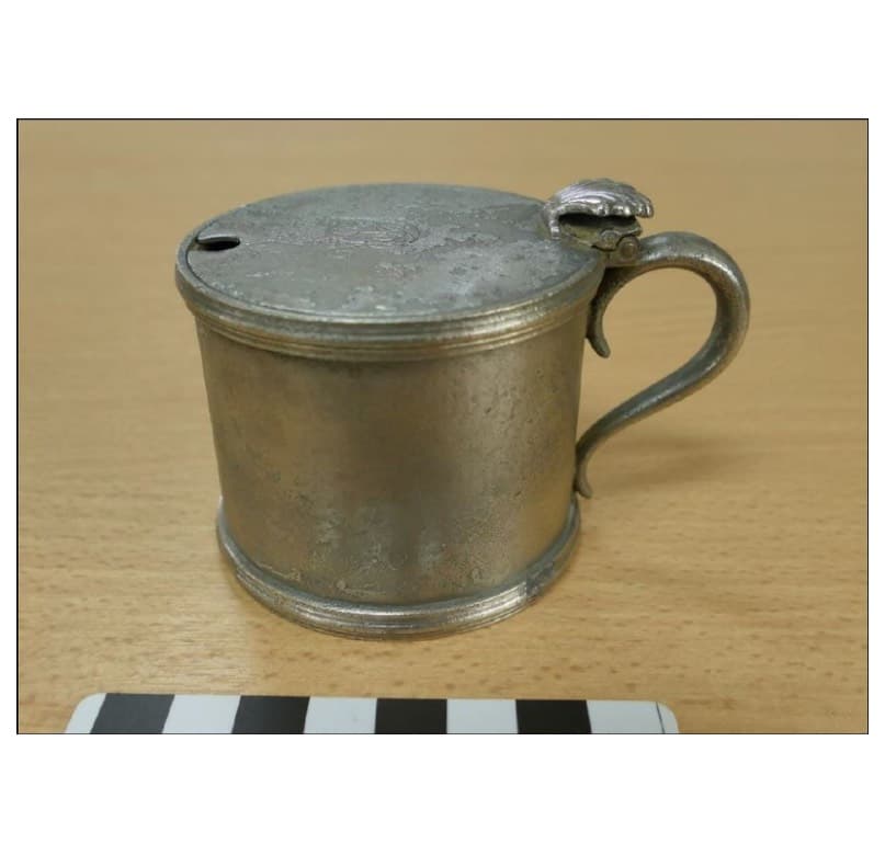 <em>Silver-plated mustard pot.</em>