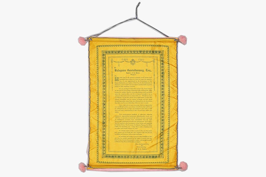<a href="/assets/ab4460af-0265-4965-995b-4292717073bd/5b-b033.jpg"><strong>A scroll with scroll holder bearing the inscription &ldquo;Presented by TAC Pasha of Madras as a Token of Friendship to B Govindasamy Esq JP on the occasion of Tea Party Given in his honour at the Adelphi Hotel on 28th July, 1930&rdquo;</strong></a><br>
28 July 1930, Singaproe<br>
<em>Collection of the Families of B Govindasamy Chettiar and SL Perumal</em>