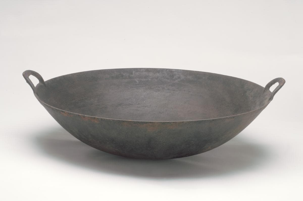 <a href="/Collection-Landing/listing/1116843"><strong>Cast iron wok</strong></a><strong><br>
</strong>
1970s<br>
2006-01671<br>
<em></em><em>Gift of Nelson Li</em>