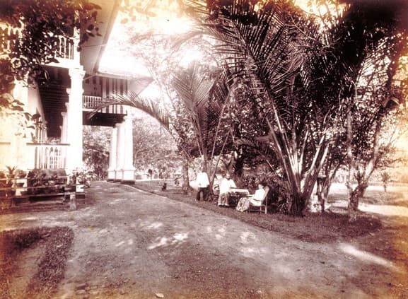 a black and white bungalow from the 1900s