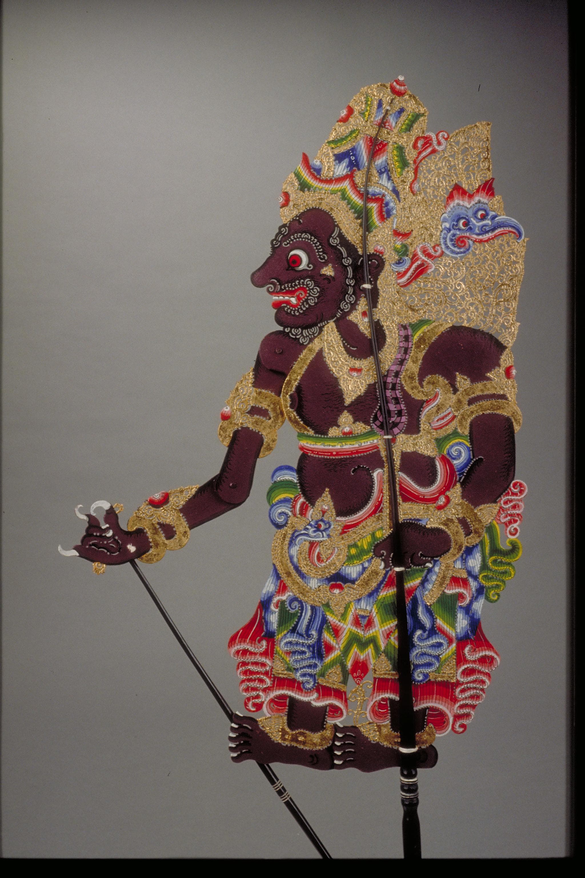 <strong><a href="https://www.roots.gov.sg/Collection-Landing/listing/1111437">Shadow puppet, Rawana</a><br>
</strong><br>
<p style="color: #000000; margin: 0in 0in 8pt;"><span>1996-01521<br>
</span>Bali, Indonesia<br>
Collection of the Asian Civilisations Museum.