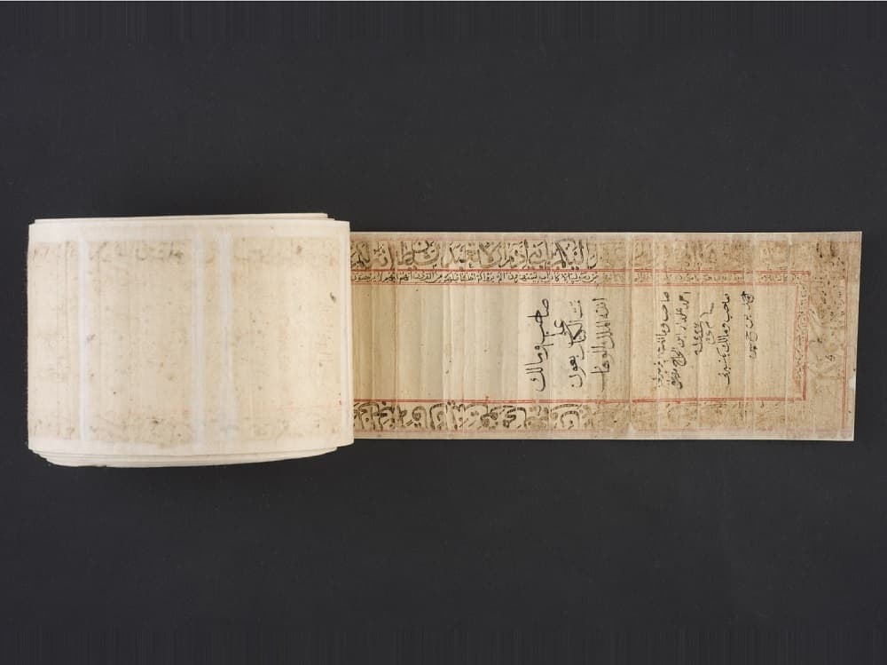 <p style="text-align: center;"><a href="https://www.roots.gov.sg/Collection-Landing/listing/1117499"><strong>Talismanic prayer scroll</strong></a><strong><br> </strong>1999-01412<br> 16<sup>th</sup> century<br> Turkey<br> Collection of Asian Civilisations Museum