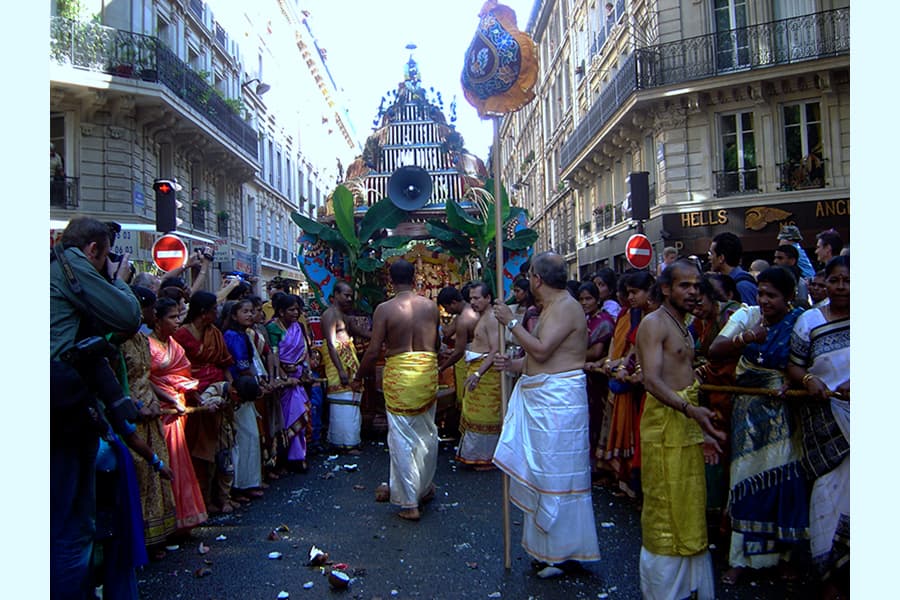 <a href="/assets/667b7e59-8a53-4502-9b99-94769343bd46/8-france-2.jpg" aria-label="View image: Celebration of the Hindu
festival Vinayaka Chaturthi in Paris, France"><strong>Celebration of the Hindu festival Vinayaka Chaturthi in Paris, France</strong></a><br><em>Courtesy of Mai-Linh Doan via Wikimedia Commons</em>