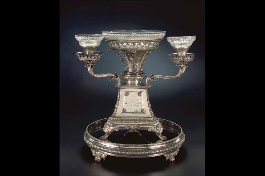<strong><a href="https://www.roots.gov.sg/Collection-Landing/listing/1023088"><strong>Silver epergne presented to William Farquhar, Singapore and England, 1824, silver.</strong><br>
</a>
Collection of National Museum of Singapore.</strong>