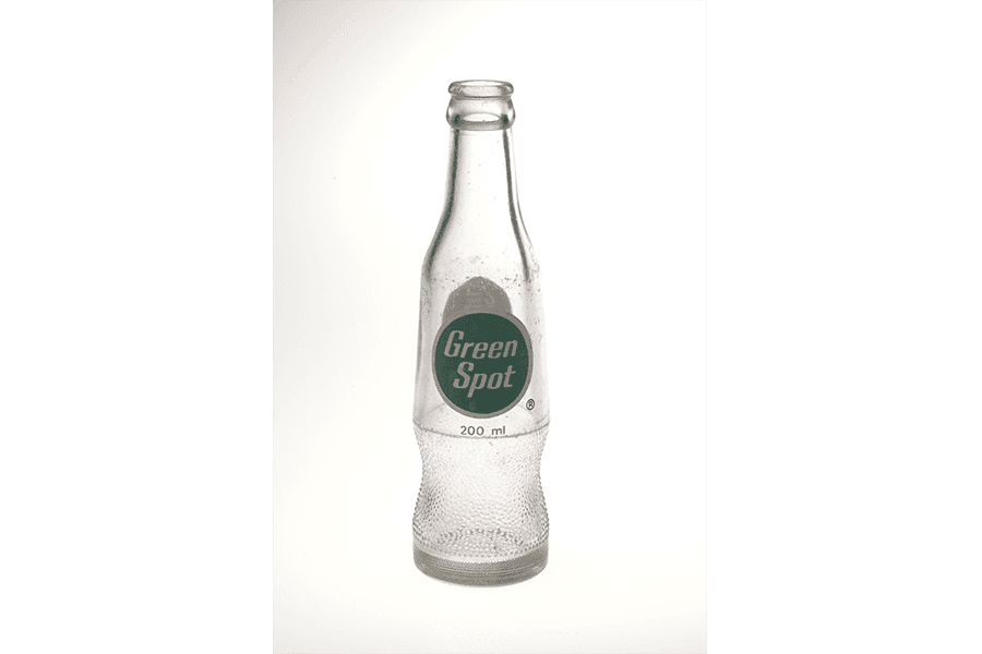 <a href="https://www.roots.gov.sg/Collection-Landing/listing/1077189"><strong>Glass bottle for Green Spot drink<br>
</strong></a>1970s<br>
2006-01413