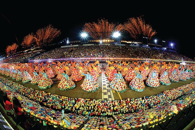 Chingay Parade 2015: “One million “We Love SG Flowers” were made by residents from all around Singapore as part of SG50 and were on display and also sewn onto costumes worn by performers in the opening act.” Image credits: People's Association