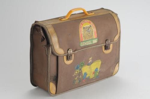 <strong>Brown school satchel </strong><br>
Collection of the National Museum of Singapore