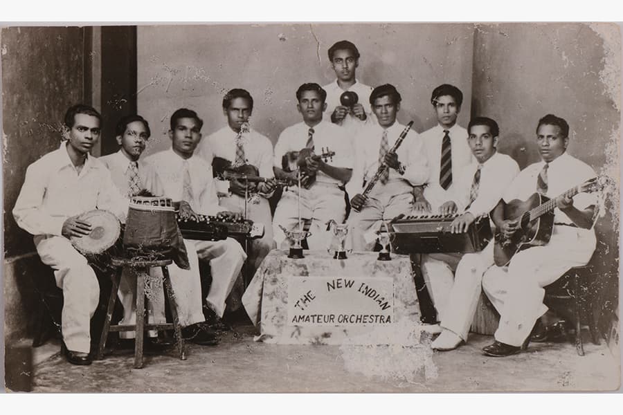 <a href="/assets/b8d43938-549d-4faa-acbf-2f0870cea029/4c-b183.jpg"><strong>Photograph of Singapore Indian Music Party (SIMP) and the Edmund Appau Family band</strong></a><br>
1940s&ndash;1950s and 1970s, Singapore<br>
<em>Collection of the Family of Edmund Appau</em>