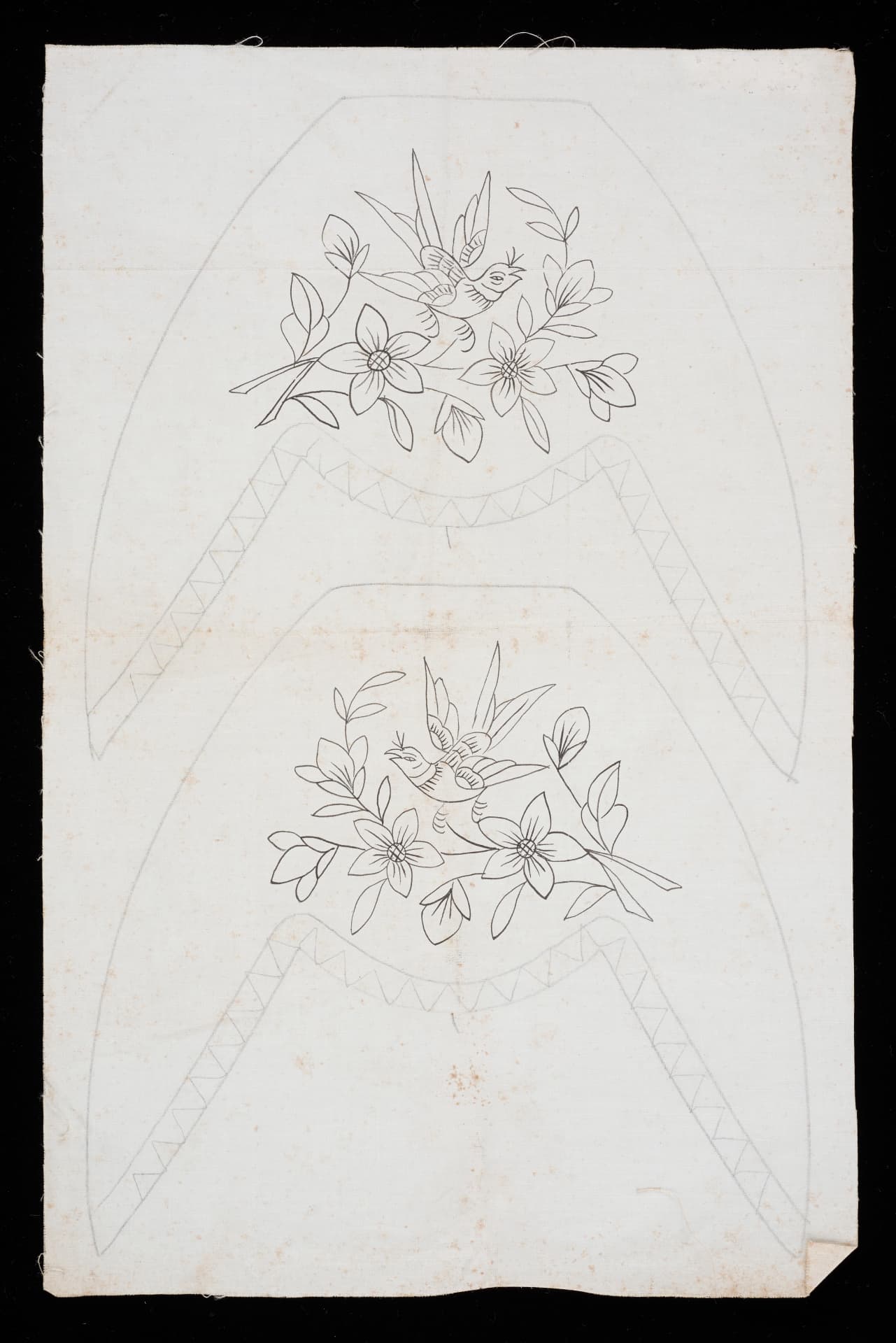 <strong>Drawn design of slipper face on canvas|<br>
</strong><br>
2017-00468<br>
20th century<br>
Singapore and Penang
<br>
Collection of the Peranakan Museum<br>
<br>
To see other slipper face designs in the NC, click <a href="https://www.roots.gov.sg/search?query=slipper%20face%20design&amp;tab=collections">here</a>.