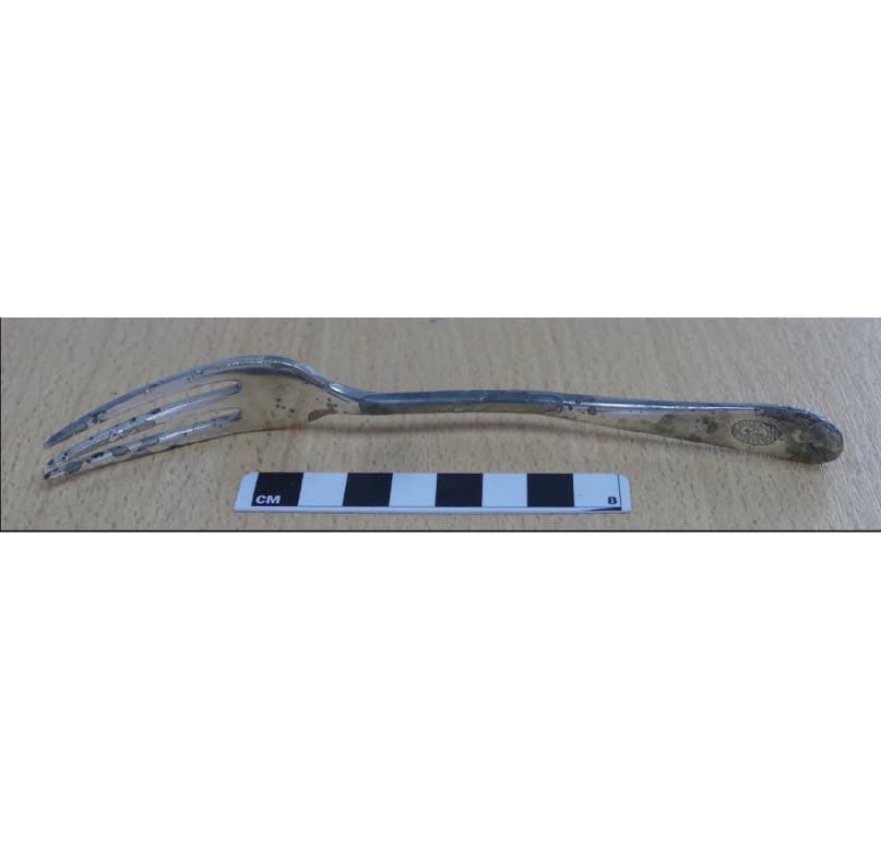 <em>Silverware fork stamped with a &ldquo;Canadian Pacific&rdquo; logo on the front and marked &ldquo;Mappin&amp;Webb&rdquo; on the reverse. Image shows the front side.</em>