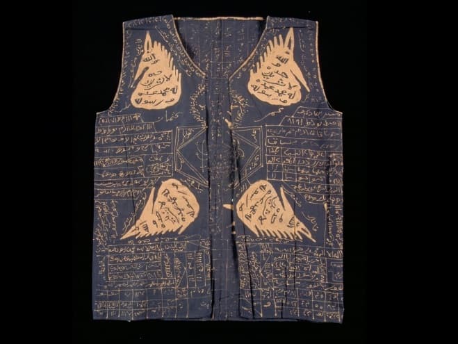 <p style="text-align: center;"><a href="https://www.roots.gov.sg/Collection-Landing/listing/1119139"><strong>Talismanic vest</strong></a><br> 1997-04181<br> Late 19<sup>th</sup> to early 20<sup>th</sup> century<br> Java or Sumatra<br> Collection of Asian Civilisations Museum. <br> Gift of Mr. and Mrs. Andy Ng