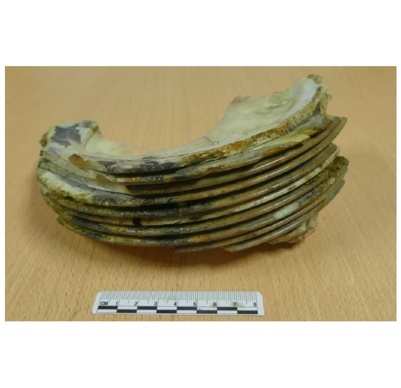 <em>Stack of plates &ndash; the glaze has melted in the fire, sticking the plates together.</em>