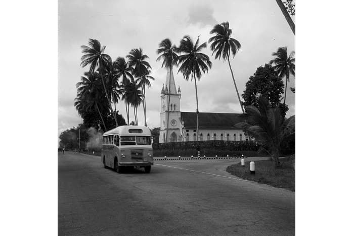 <strong>Ponggol Bus Service Vulcan Bus Passing by the Church of the Nativity of the Blessed Virgin Mary along Upper Serangoon Road</strong><br>
February 1955<br>
F. W. York Collection<br>
Courtesy of National Archives of Singapore