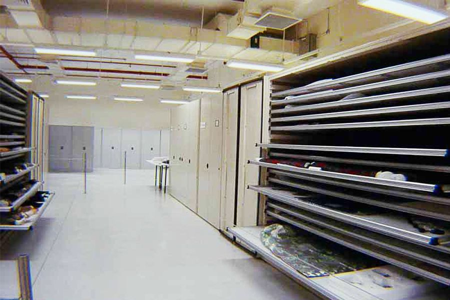 <p style="color: #000000; margin: 0cm 0cm 8pt;"><span>Drawer storage for textiles in the Garments Store.</span>