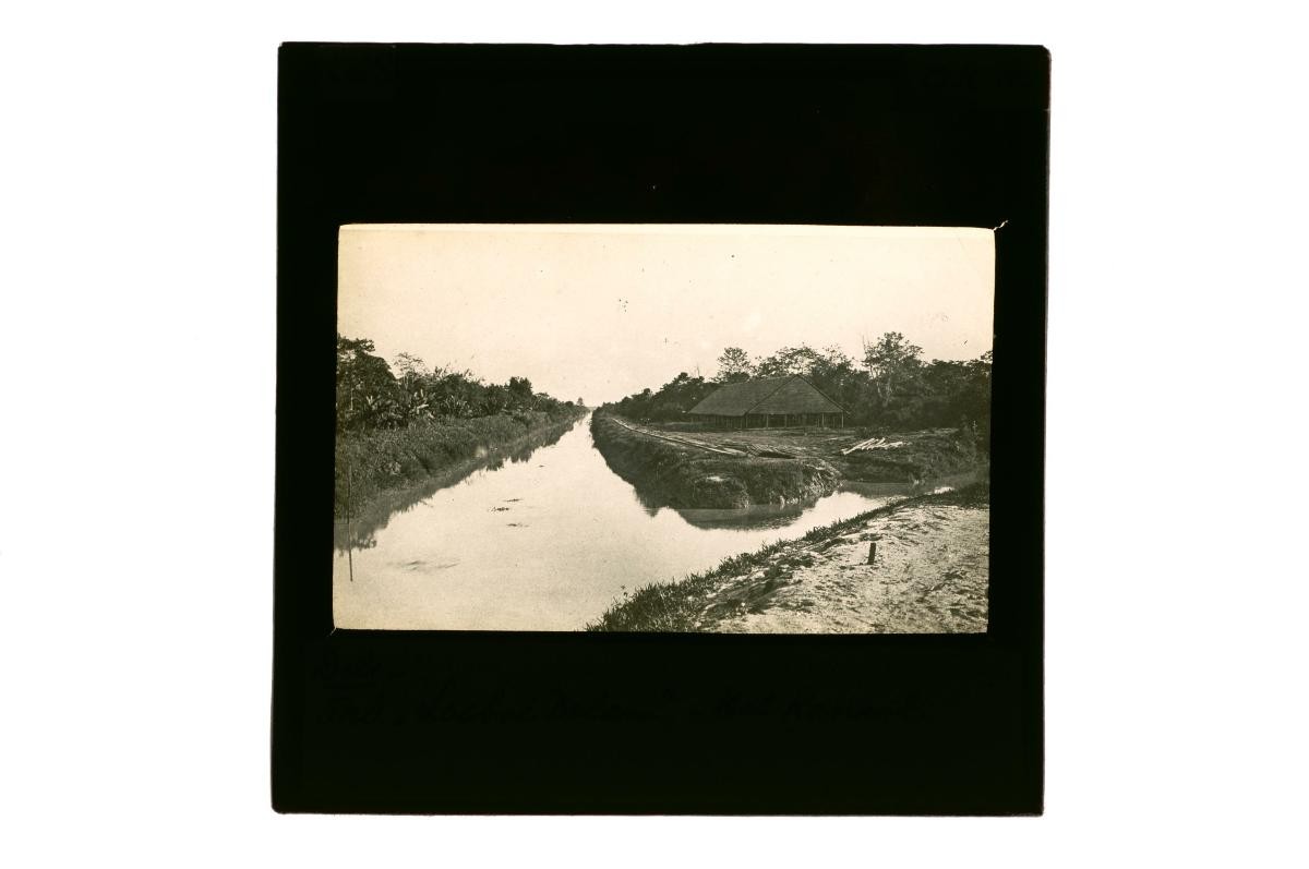 A glass lantern slide depicting a river scene