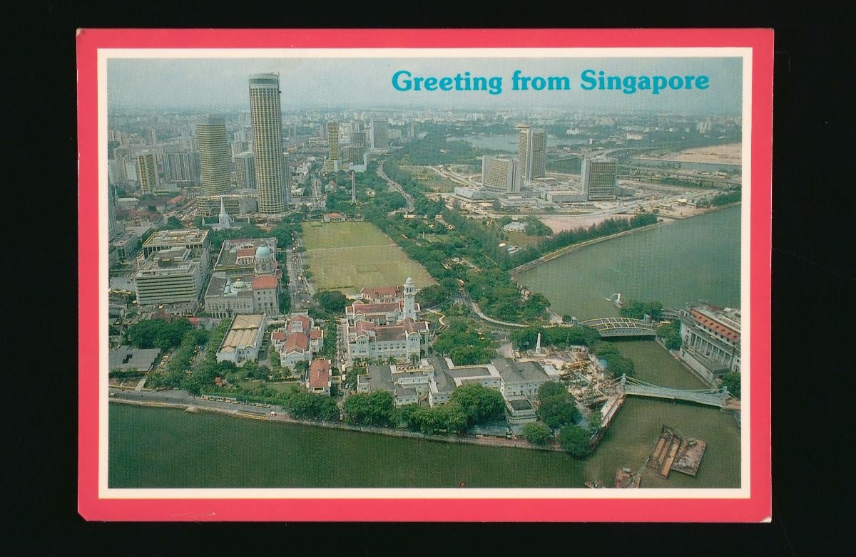 Aerial view of the mouth of the Singapore River, the civic district and the outlying city area